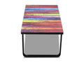 Coffee table with rainbow print. Glass top.