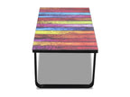 Coffee table with rainbow print. Glass top.