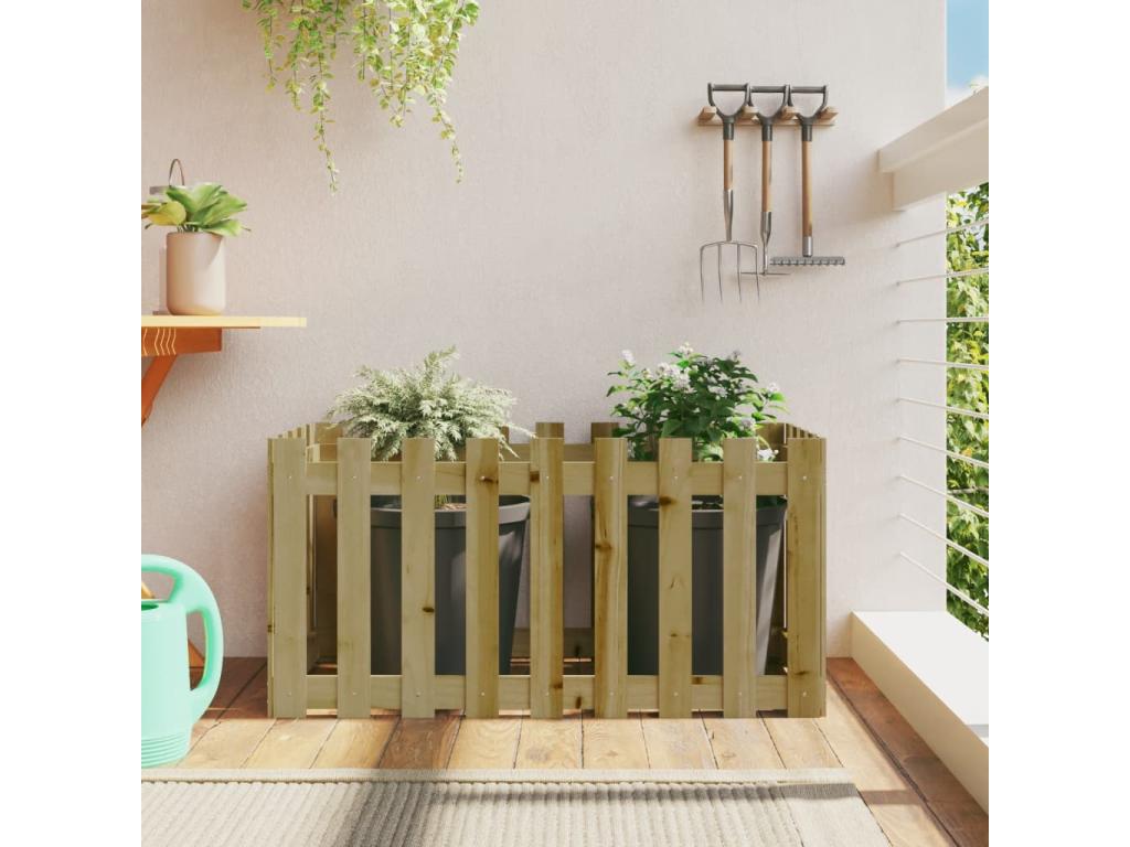 Raised garden bed with a designer fence made of impregnated pine wood